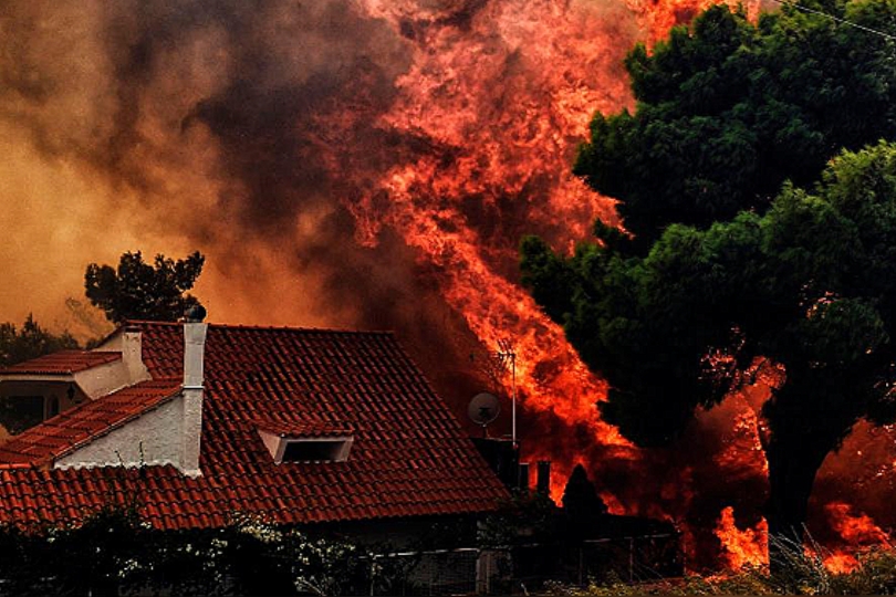 Six convicted amid outrage over wildfires that killed 104 in a Greek resort. 